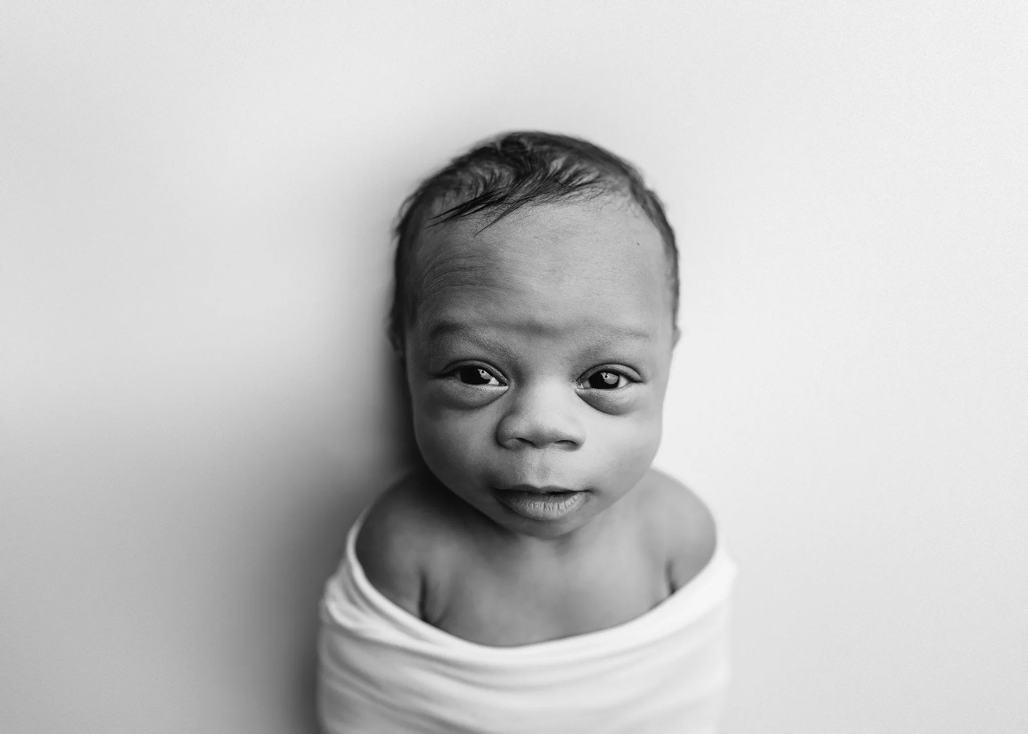 newborn boy expressions during photo shoot, newborn photography ashland ne, walton newborn photographer, best newborn photography omaha