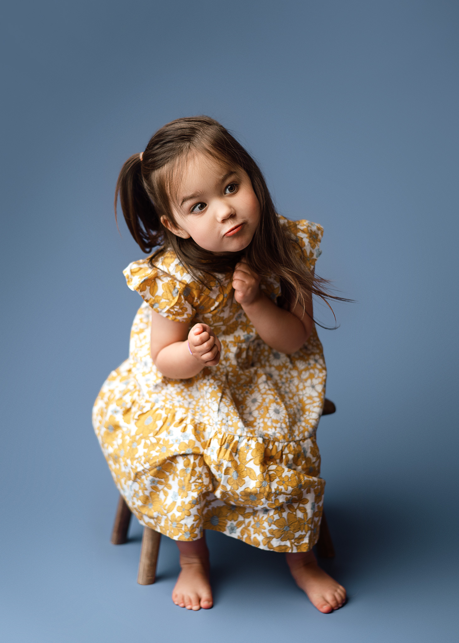 child photography nebraska, 3 year old portrait session, newborn nerds seamless paper, yellow and blue photo session, flower dress carters