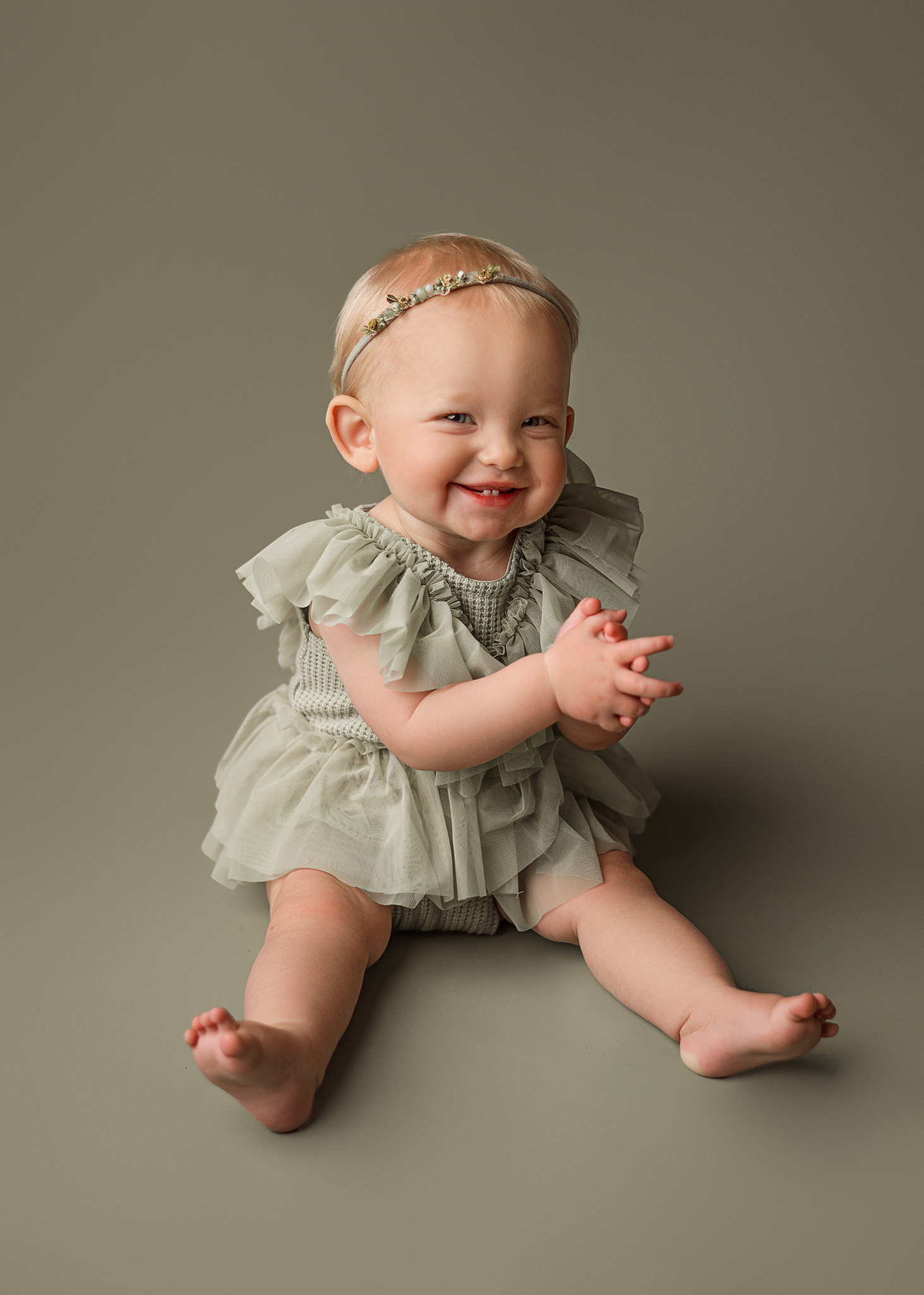 green photo set ups, baby girl wearing green for her milestone session, omaha baby photographer