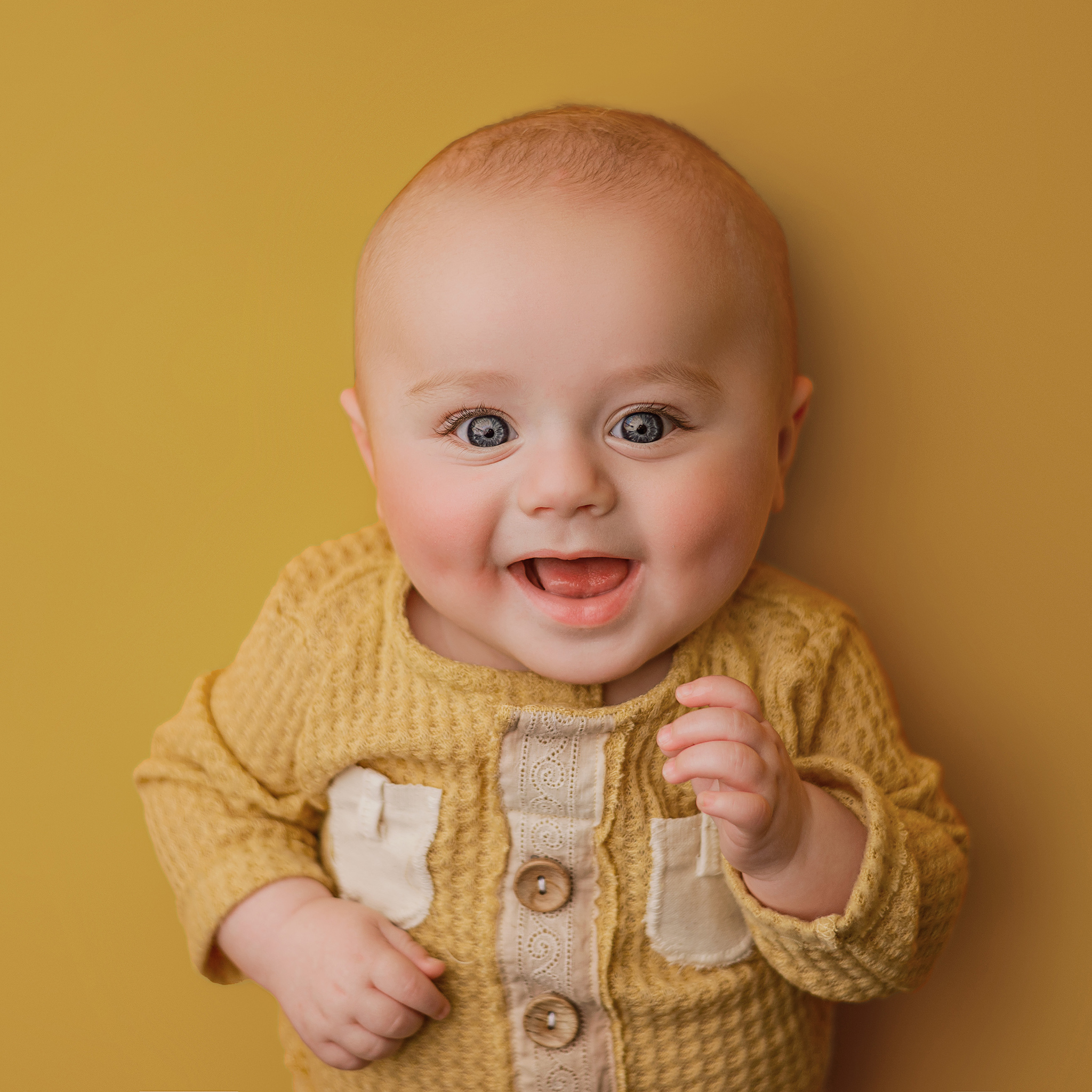 baby boy in yellow for milestone session, simple milestone session, baby photographer, studio photographer lincoln nebraska