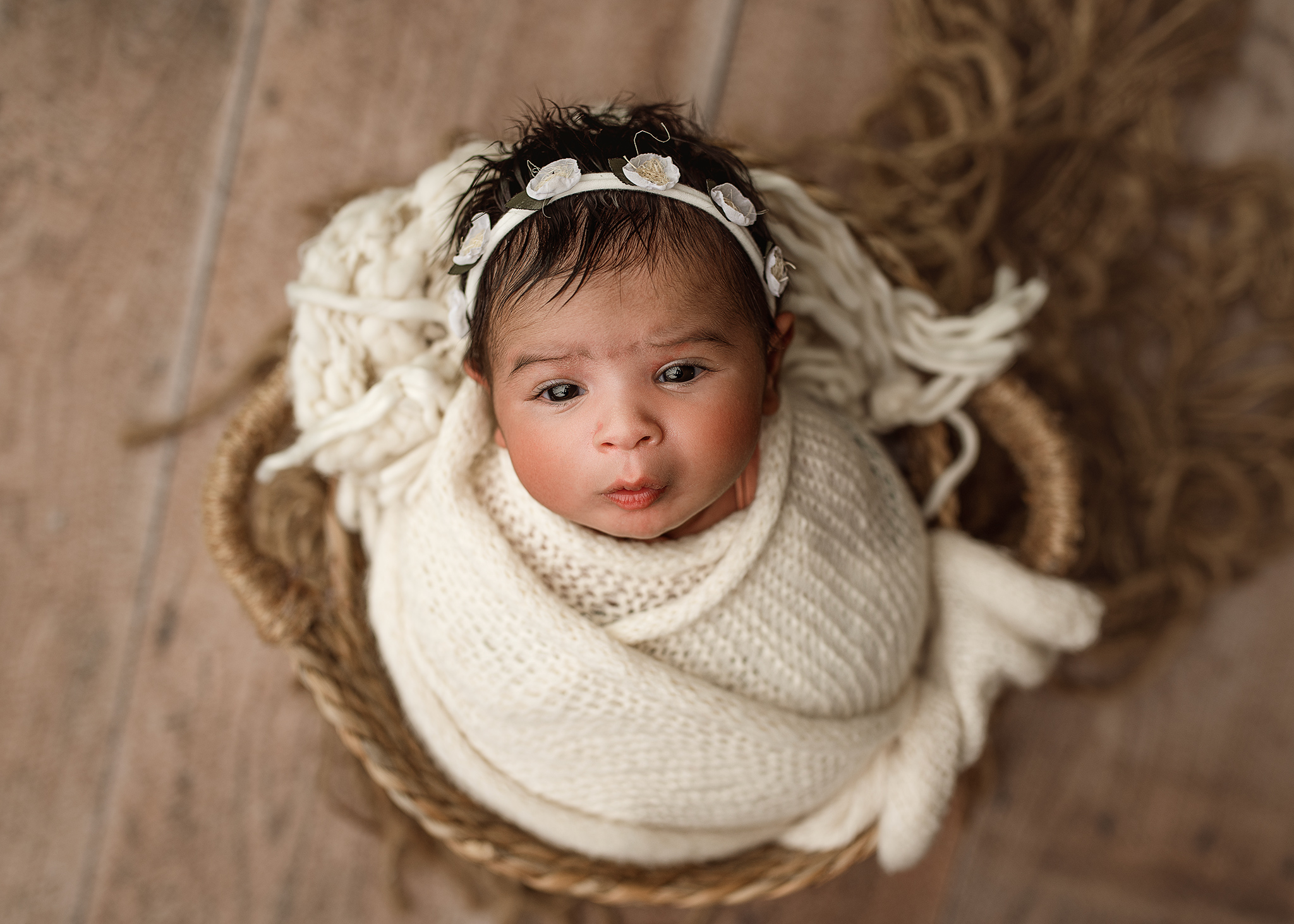 baby girl with her eyes open during newborn photoshoot, awake baby newborn photos