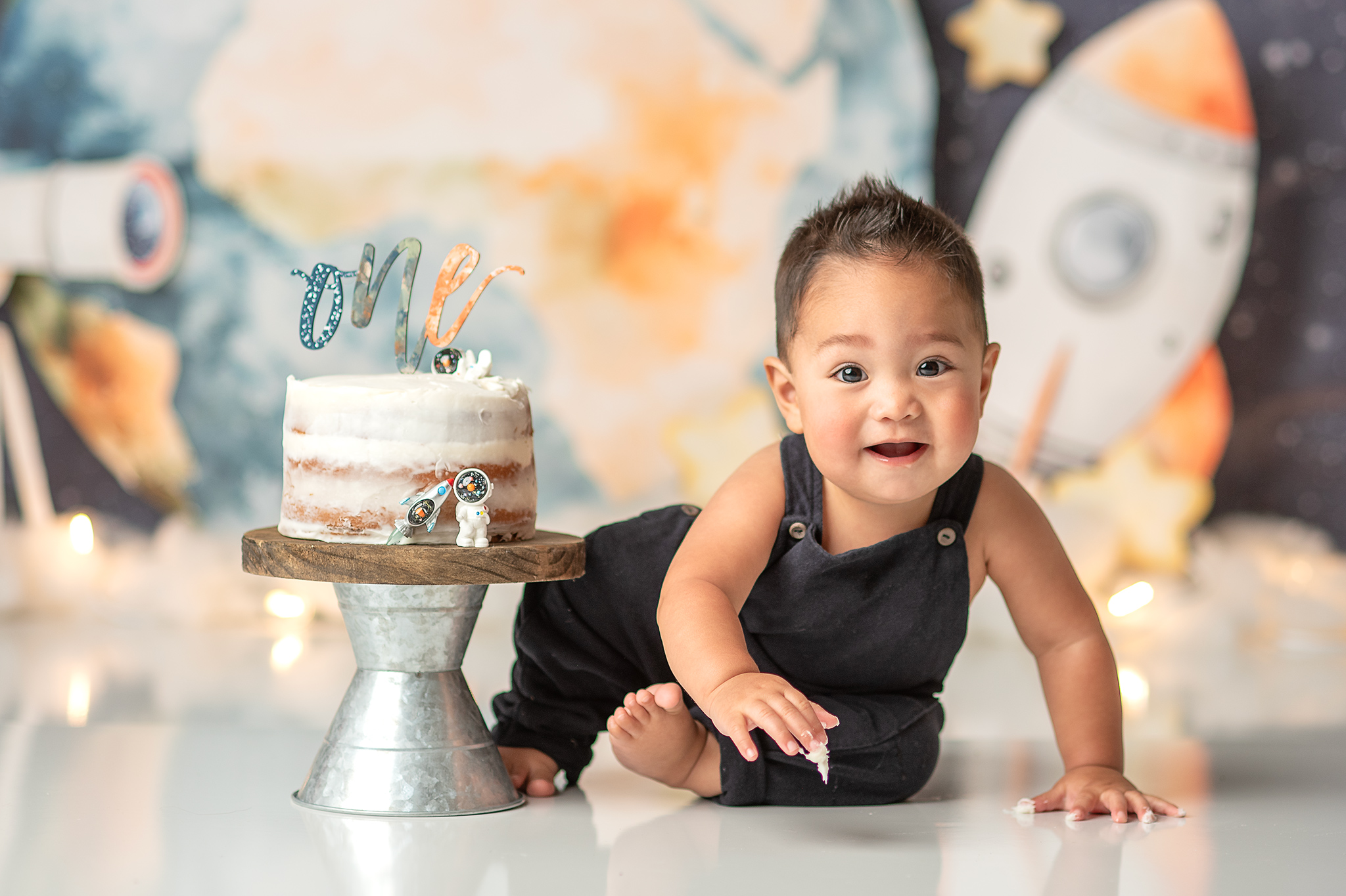 space themed cake smash session, space, around the sun birthday theme, birthday photographer nebraska, baby photoshoot