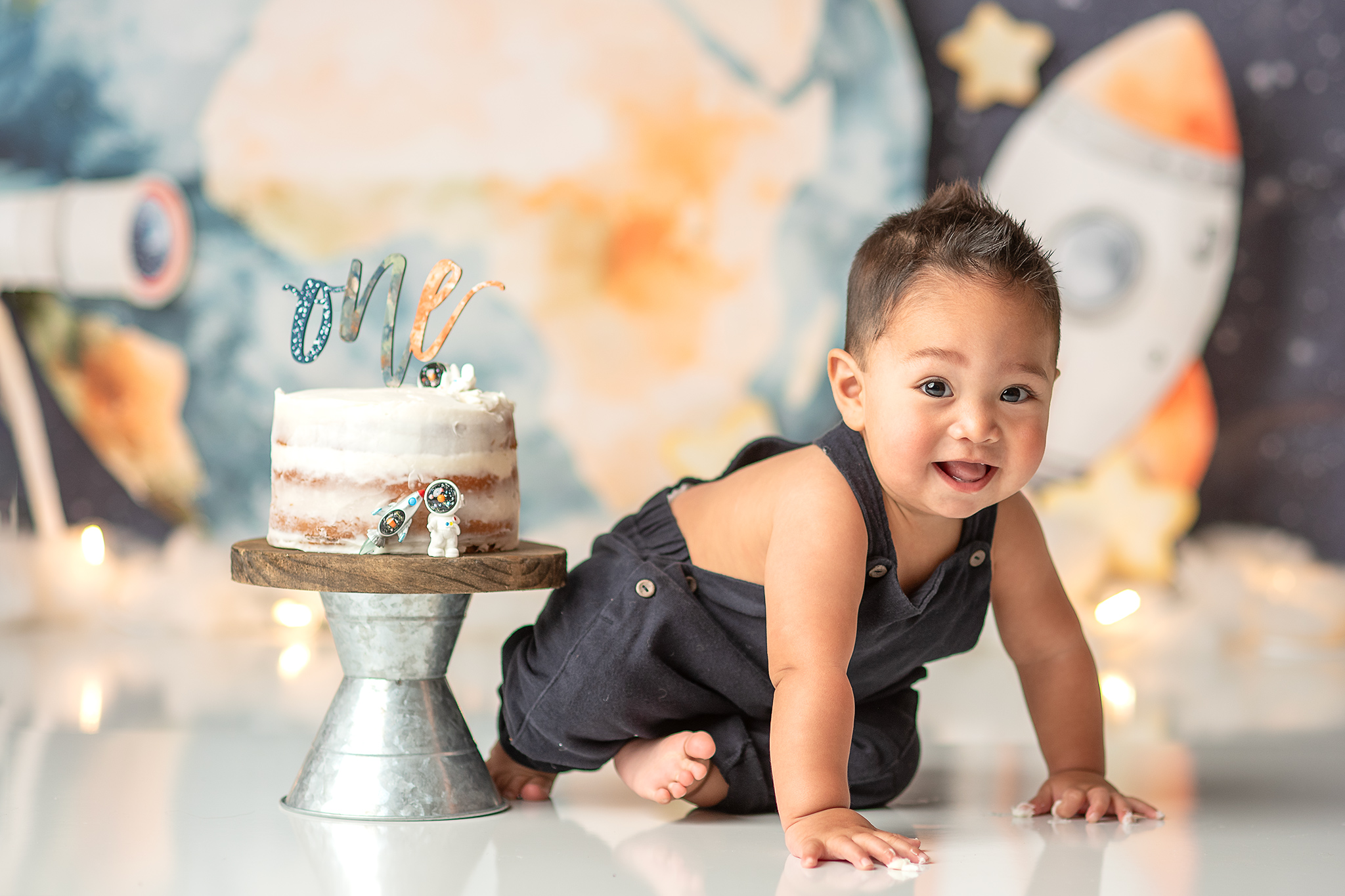 boy smiling for his first birthday photos, lincoln nebraska baby photographer