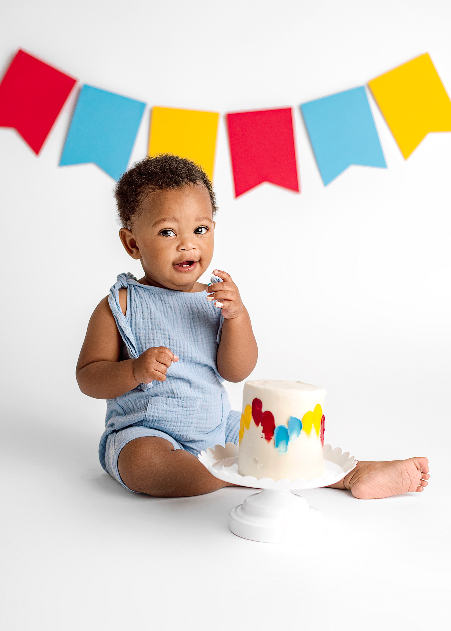 first birthday photoshoot ideas, sesame street cake smash colors, bold cake smash, first birthday photography nebraska