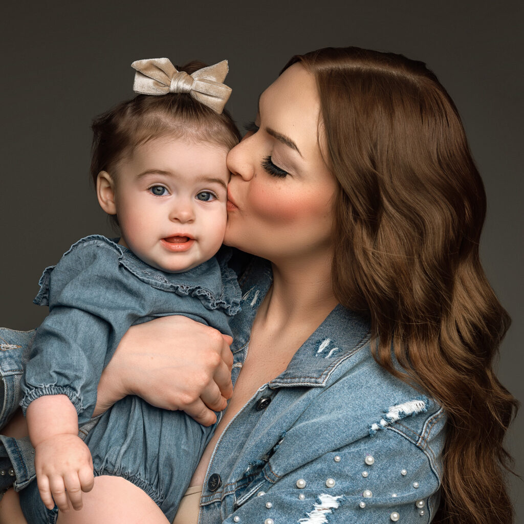 motherhood photo session near me, mommy and me photos, mom and baby wearing jean for a photoshoot. baby photography lafayette IN