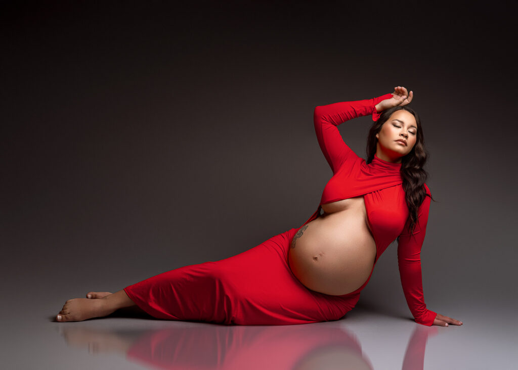 pregnant mom in red, red maternity, Indiana maternity photographer, best maternity photoshoot in the midwest, luxury maternity photos