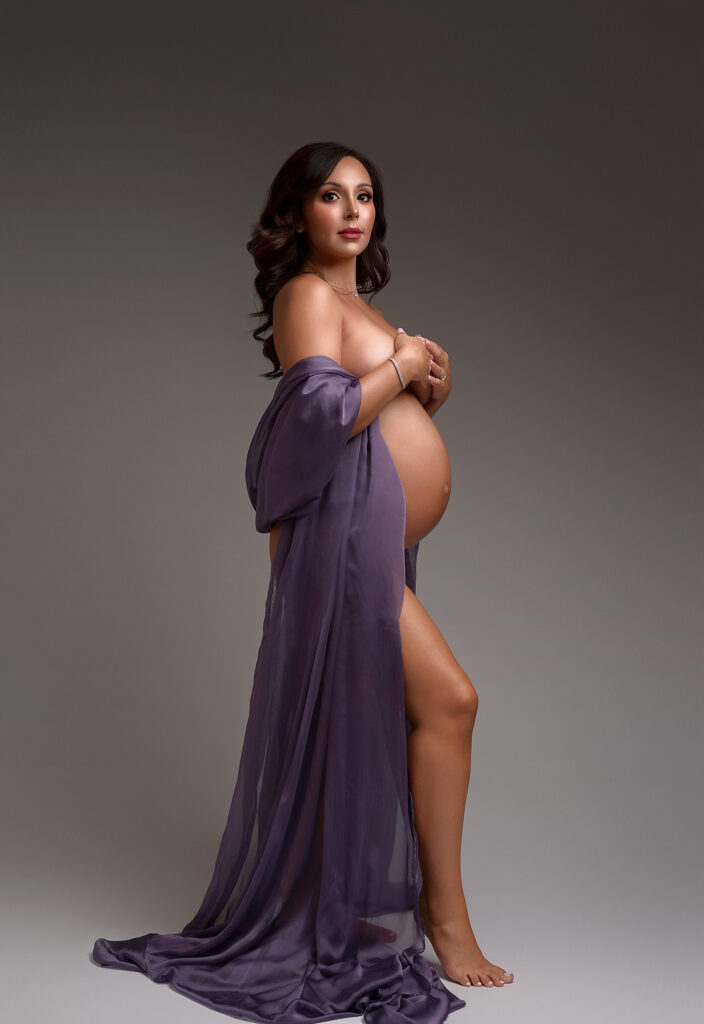 Mom wearing purple scarf for maternity session with brenaya faye photography in Indianapolis indiana