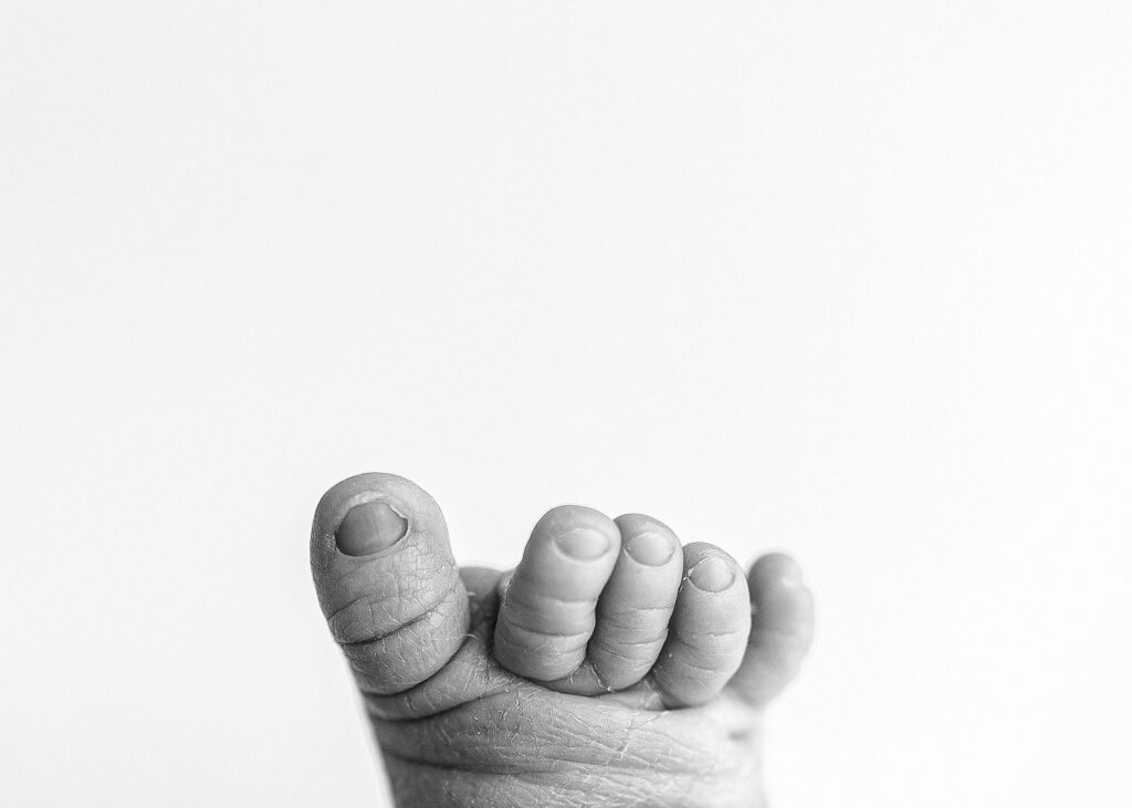 tiny baby details done at a newborn portrait session in west lafayette indiana, traveling in home newborn session, detail shots of baby feet