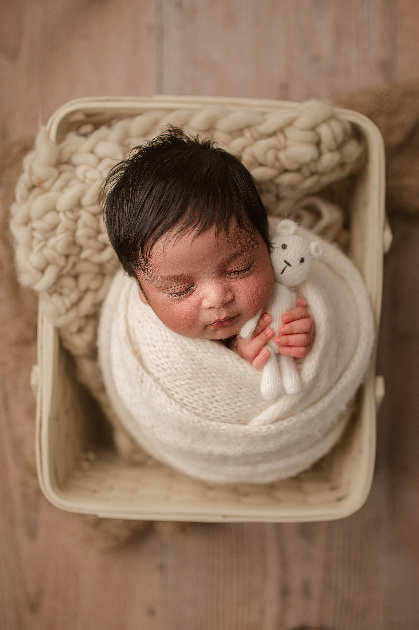 indianapolis-indiana-newborn-photographer Newborn baby wrapped in cream during an in-home newborn photography session