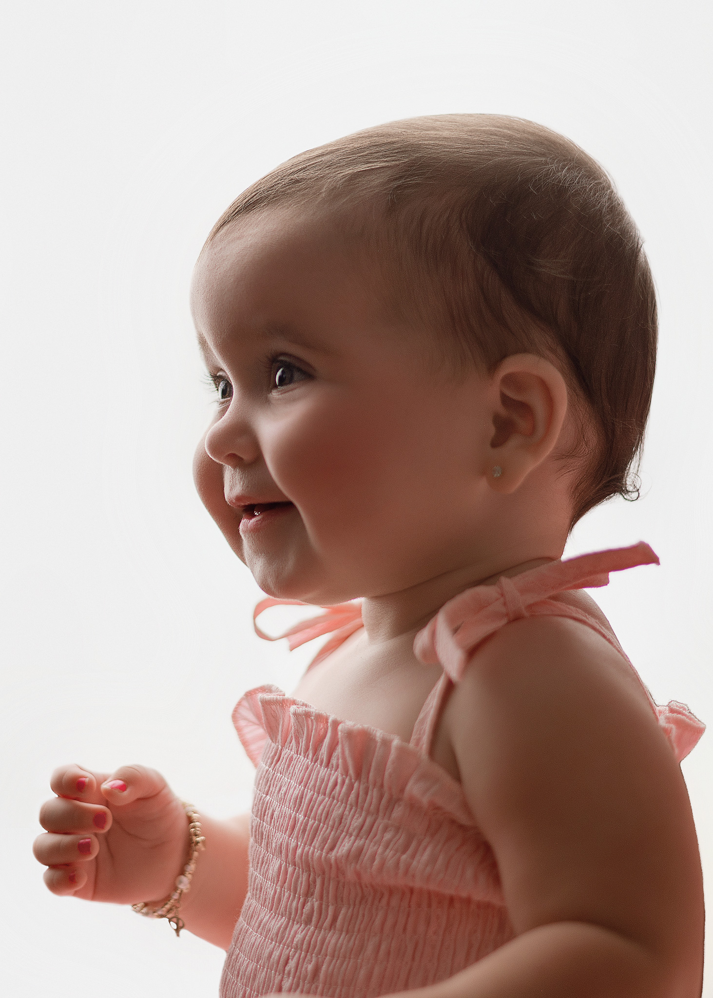 Timeless first birthday portrait of baby girl in pink by Indianapolis baby milestone photographer