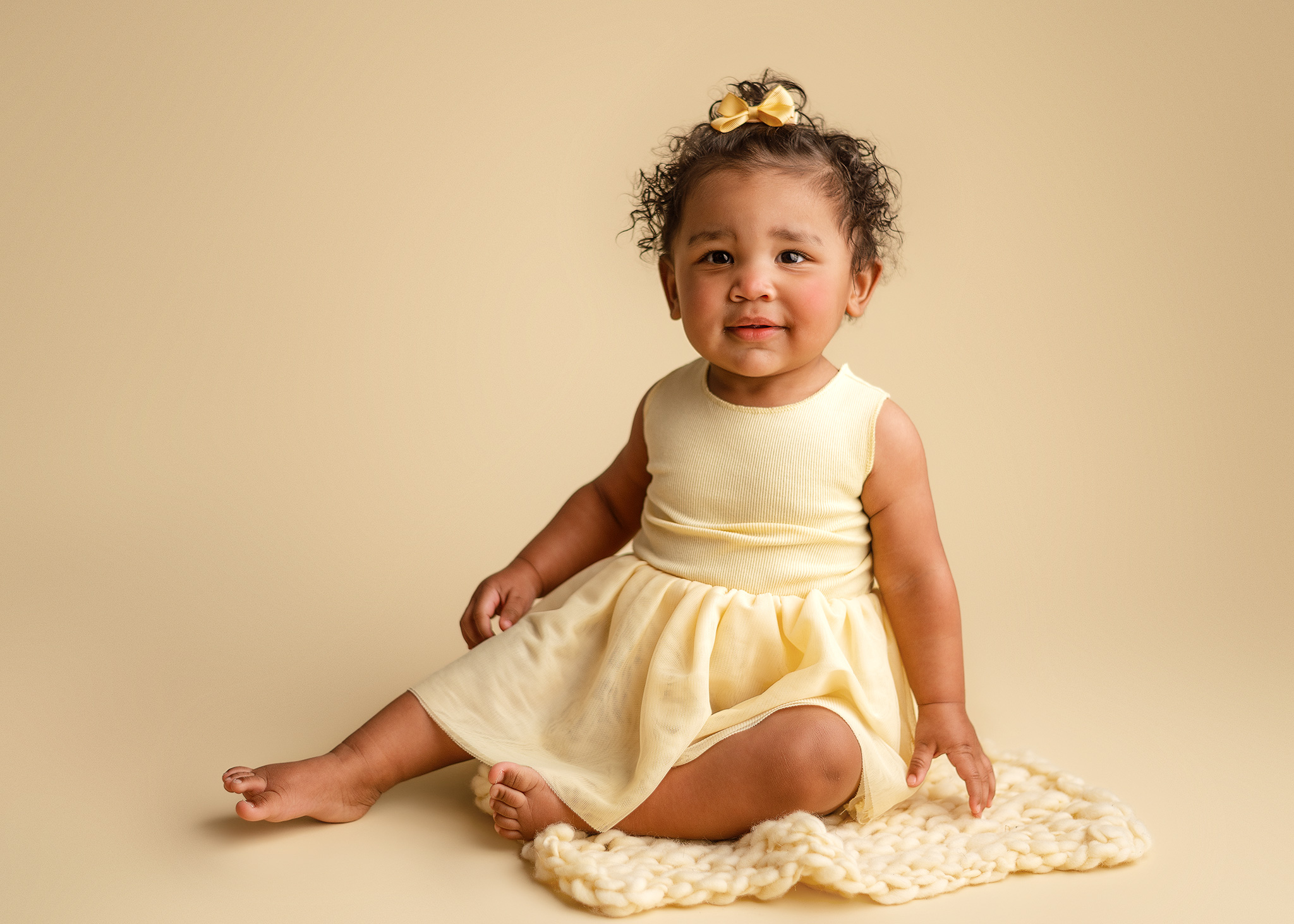 Timeless one year old baby girl portraits with professional studio-style photography